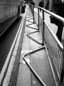 A line of metal barriers, the bases of which are perfect for running drills